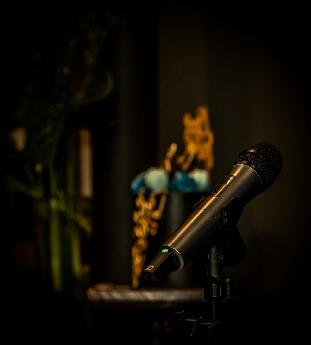 Close-up of a professional podcast microphone in a studio