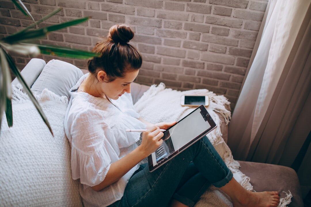 person reading blog on tablet